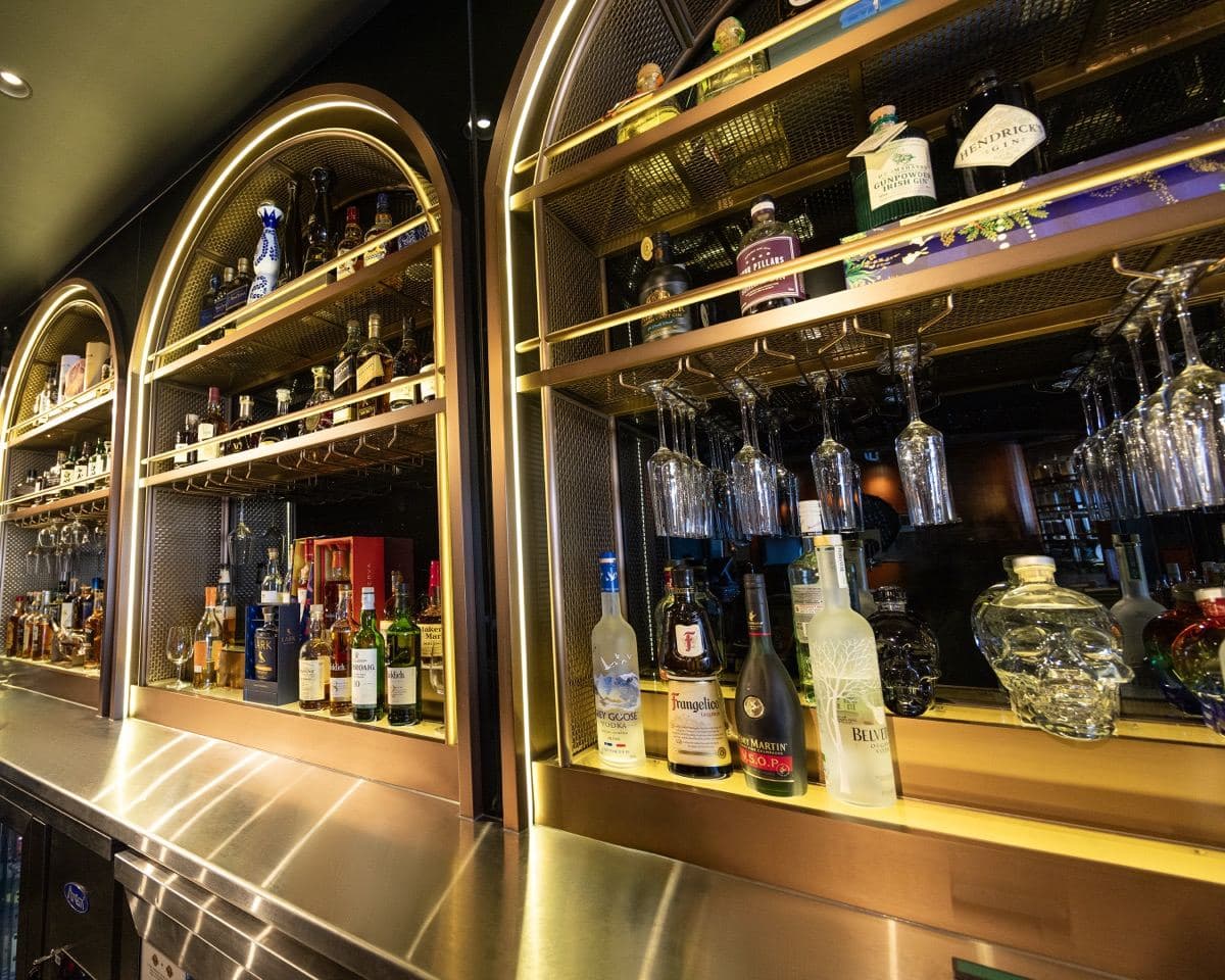 The illuminated bar shelves at Gunpowder Social