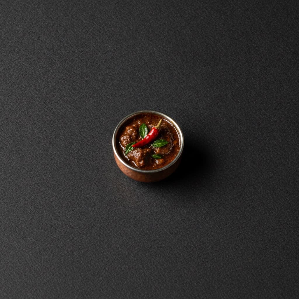 A sauté pan alight on the kitchen stove at Gunpowder Social